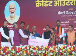 Hon'ble Finance Minister Smt. Nirmala Sitharaman, along with Shri Samrat Choudhary, Hon'ble Deputy Chief Minister of Bihar, hands over sanction letters from banks to beneficiaries under various Central Government schemes during the Credit Outreach Programme in Madhubani, Bihar on 30.11.2024