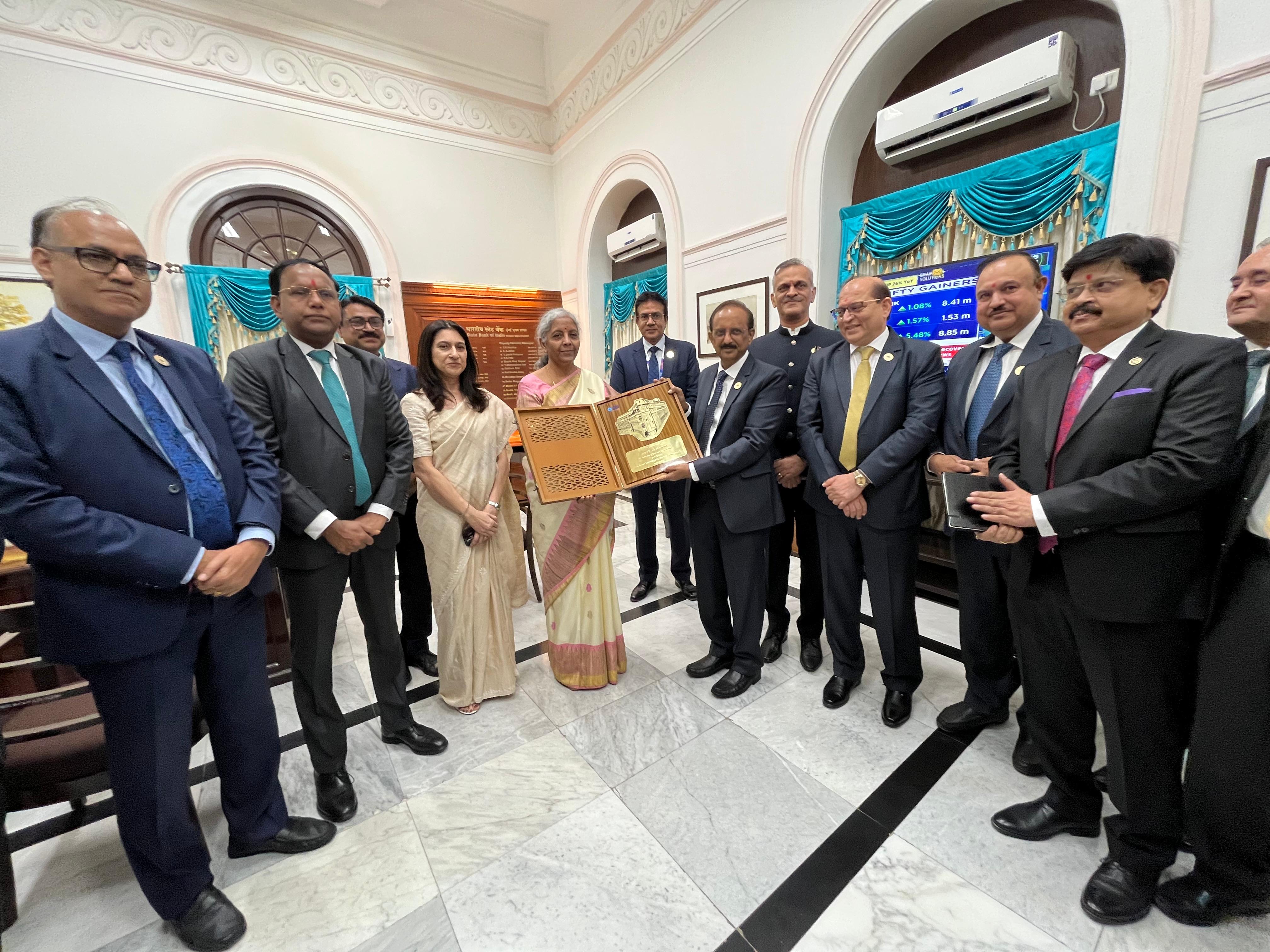 Hon'ble FM Smt. Nirmala Sitharaman visits the SBI Mumbai Main Branch Building and interacts with the officials and staff there. During the visit, Smt. Nirmala Sitharaman was accompanied by DFS Secretary Sh. M. Nagaraju and SBI Chairman Sh. CS Setty.